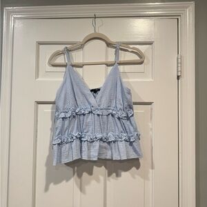 South moon under light blue with ruffles tank top